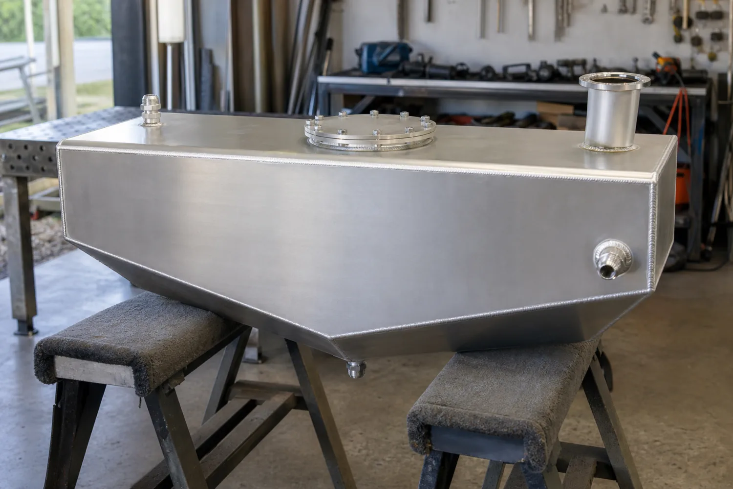 Custom fabricated marine-grade aluminium boat fuel tank with welded sender flange, filler and pick-up fittings, made by Specialised Stainless